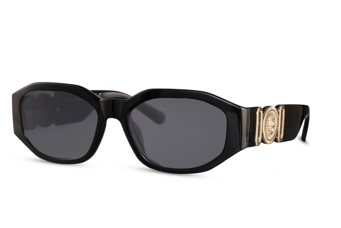 angled sunglasses. Black lenses. Black frames. UV400 protected.