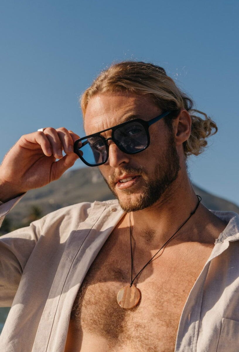 Blue lens specs. Black frames. UV400 protected.