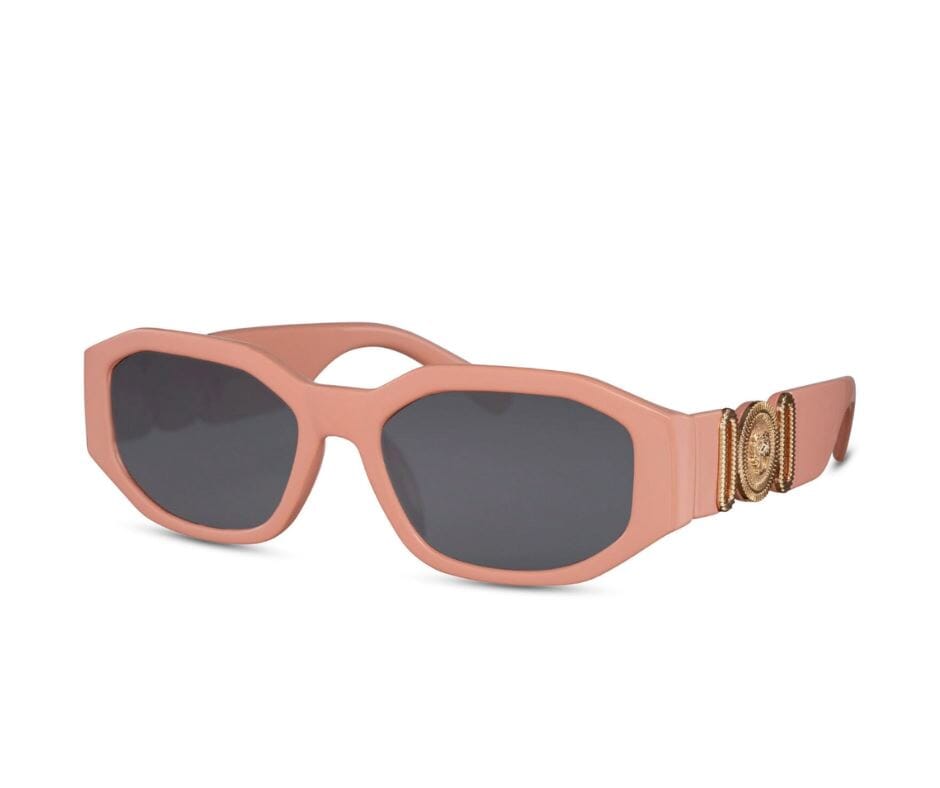 Geometric specs. Orange frames. Gold embellished detail. UV400 protected.