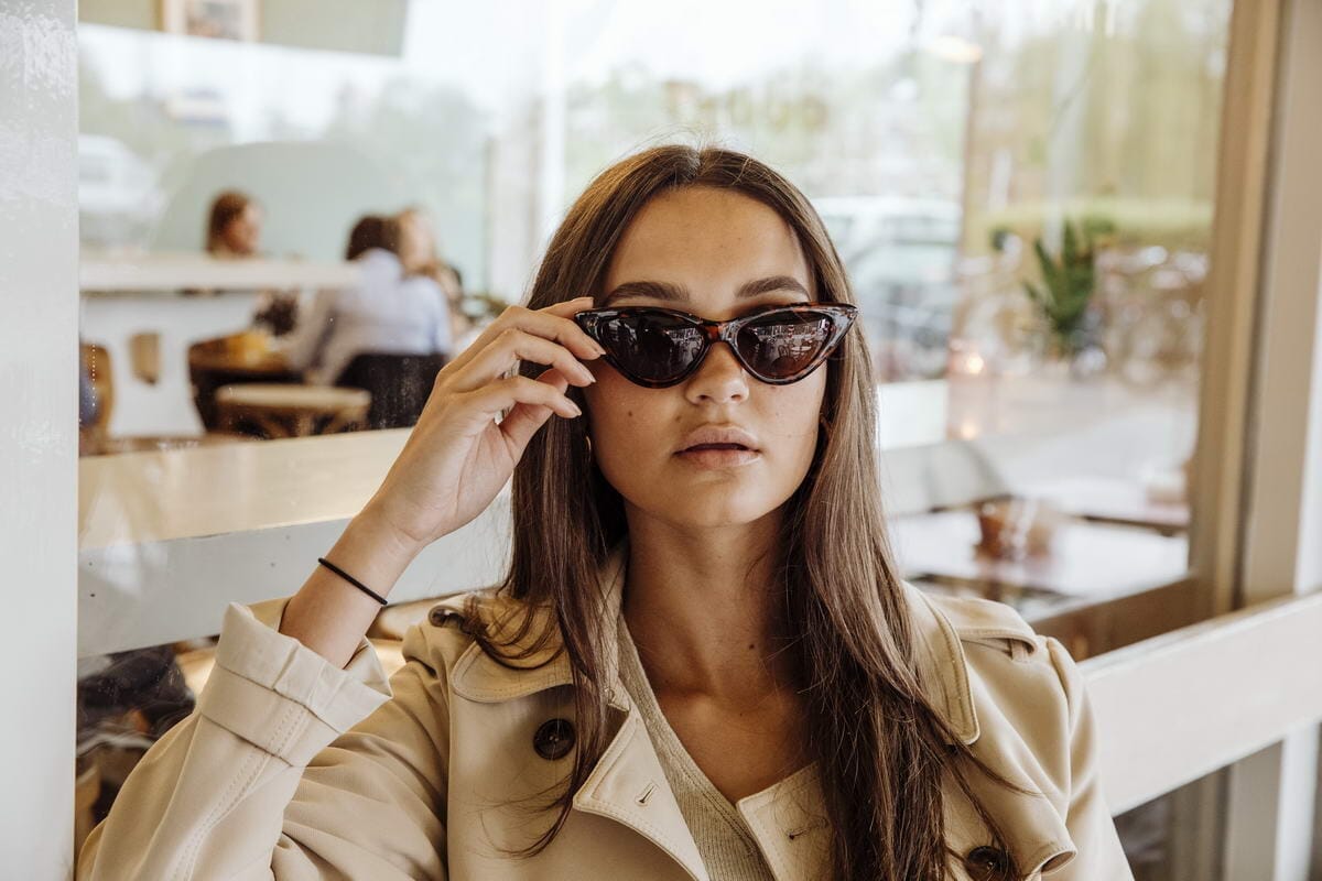 Narrow cat frames. Brown lenses. Tortoiseshell frames.