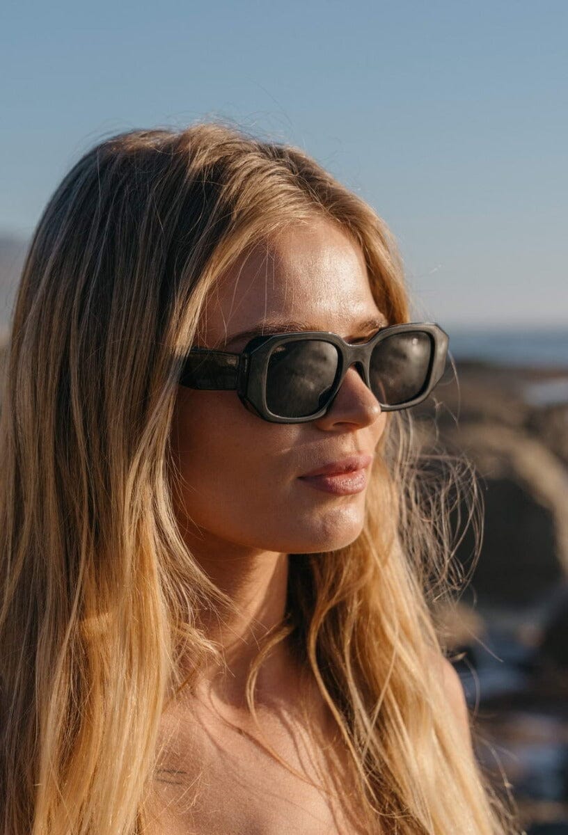 Rectangle black glasses. UV400 protected. Black lenses.